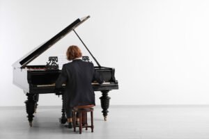 Playing Piano After Moving: Is It Safe and How Long to Wait?